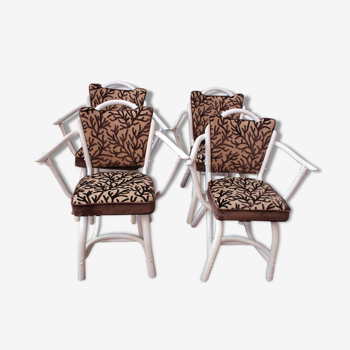 4 white rattan chairs