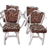 4 white rattan chairs