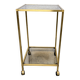 Vintage rolling table in brass and smoked glass