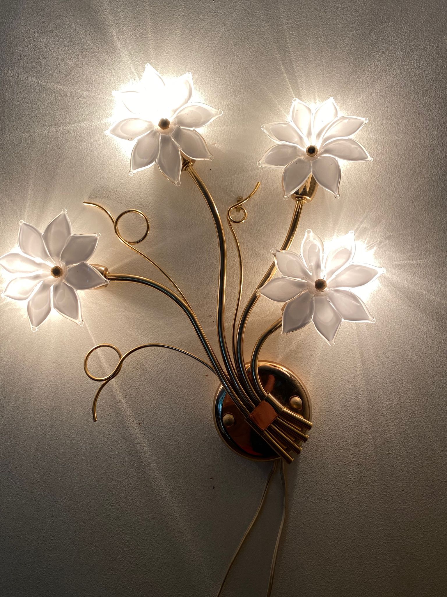 Glass and gold metal wall light
