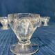 Set of 12 hand-sized crystal glasses with flower decoration