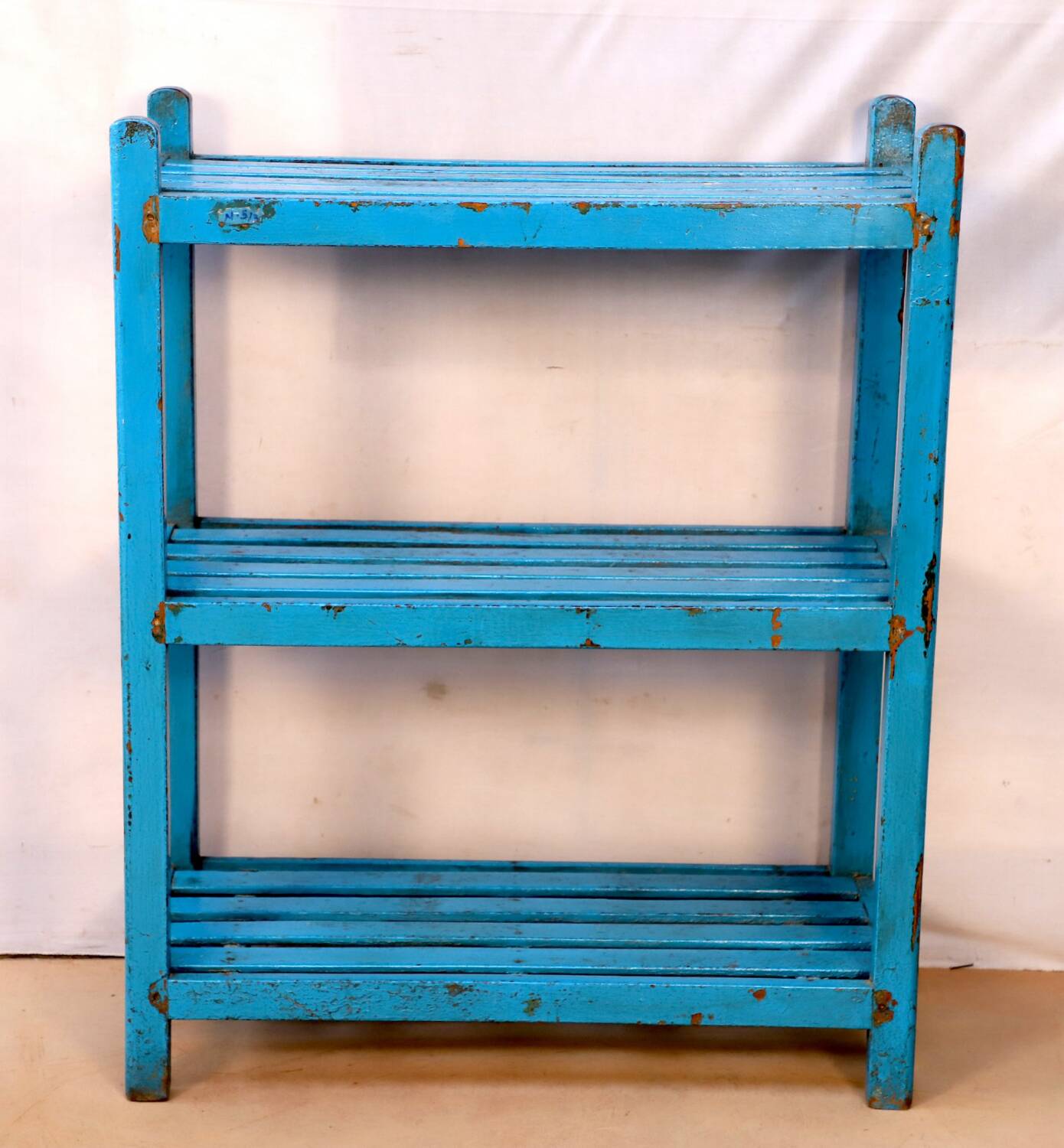 Teak shelf with original blue patina.