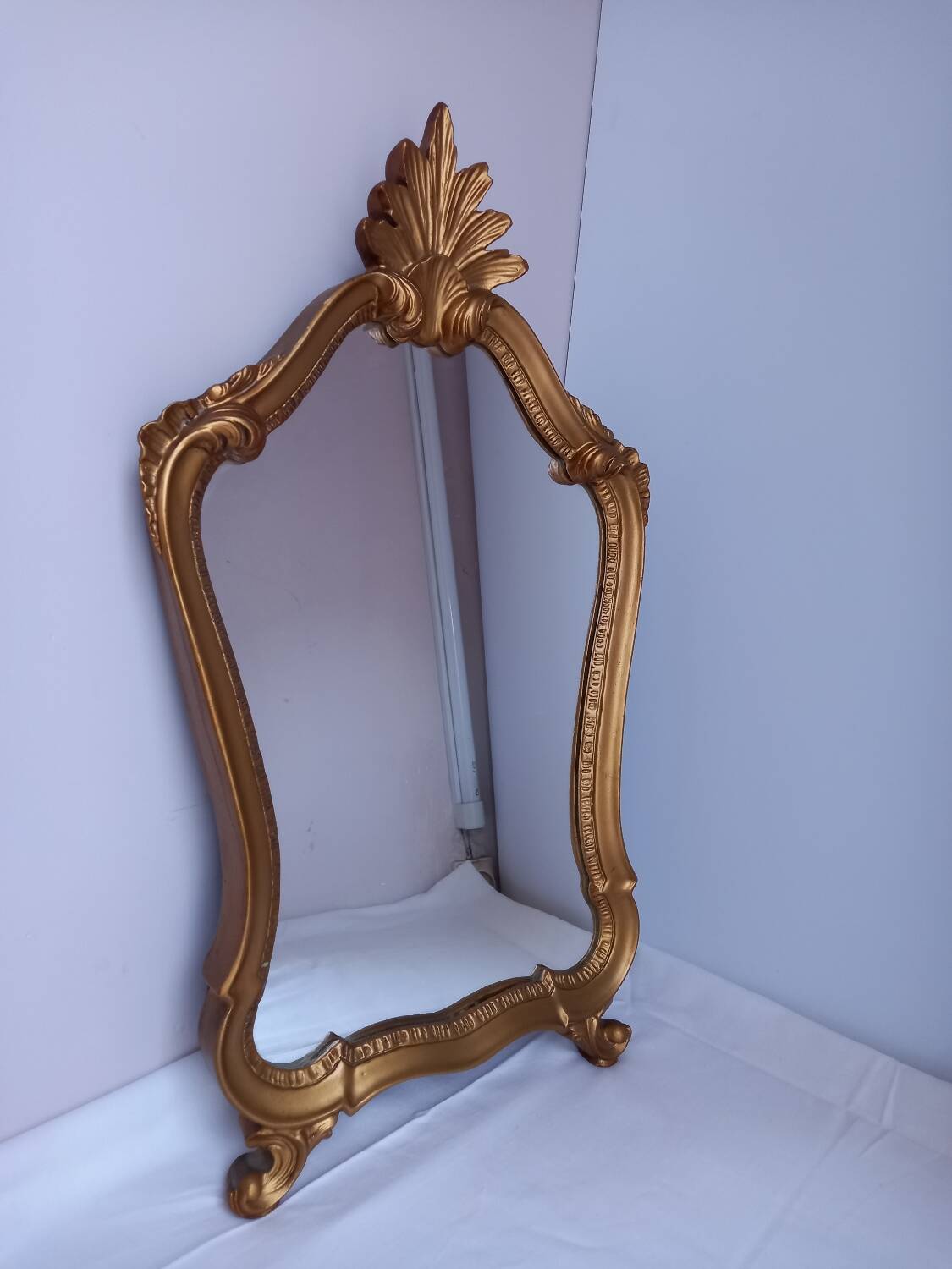 Antique gilded wooden mirror