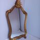 Miroir ancien en bois doré