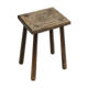 Old wooden stool with log feet