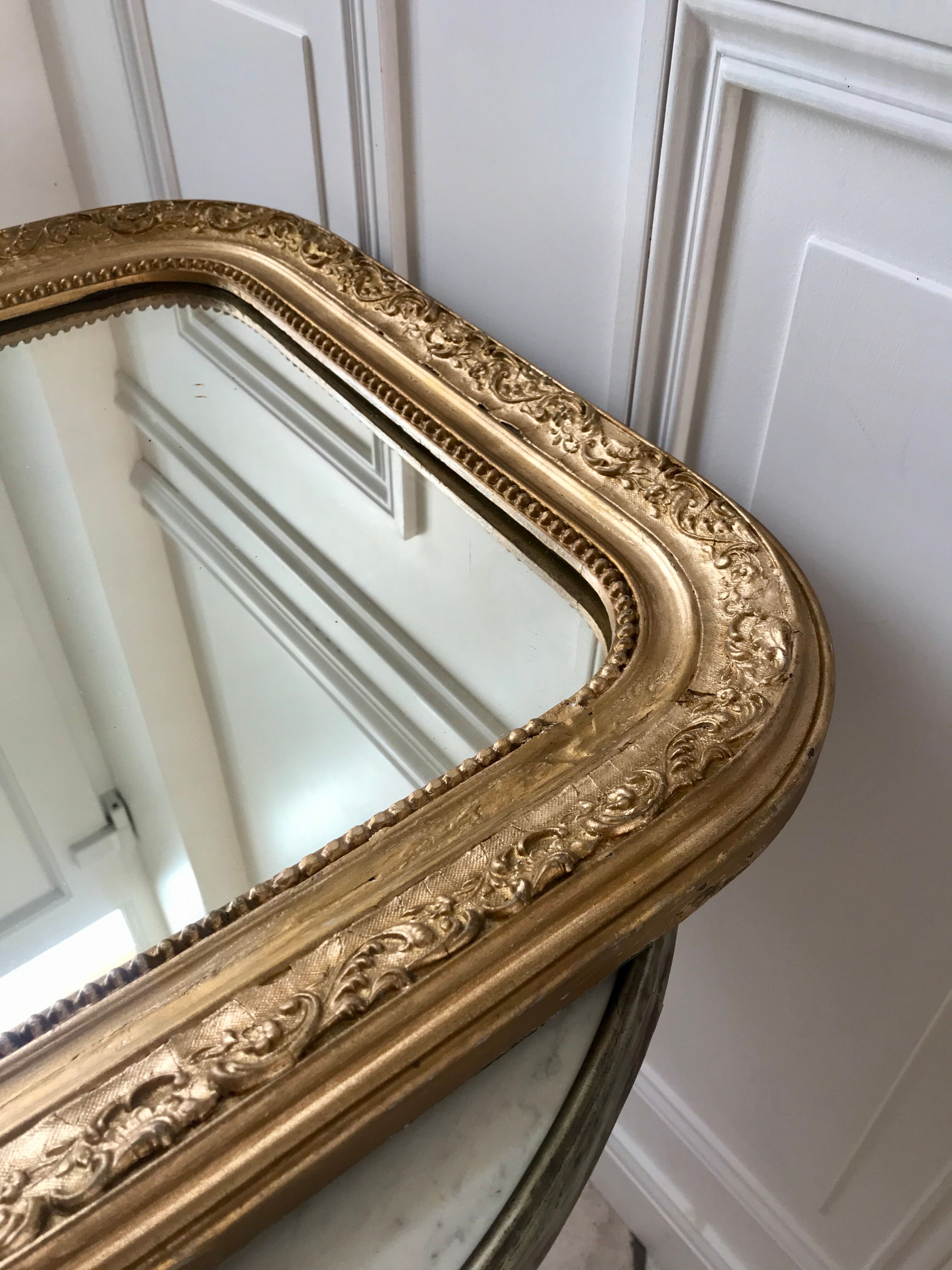 Wooden mirror and gilded stucco early twentieth century