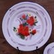 7 printed floral enamel plates "bon voyage" Made in China