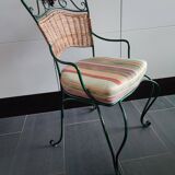 Metal and rattan chair with vine and grape decor