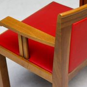 A masterpiece of Italian modernism: eleven Aldo Rossi red Teatro arm chairs