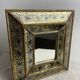 Eglomisé mirror with wooden parecloses