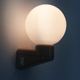 Vintage wall lamp in beige pvc with pink dot and globe in white opaline. Year 70