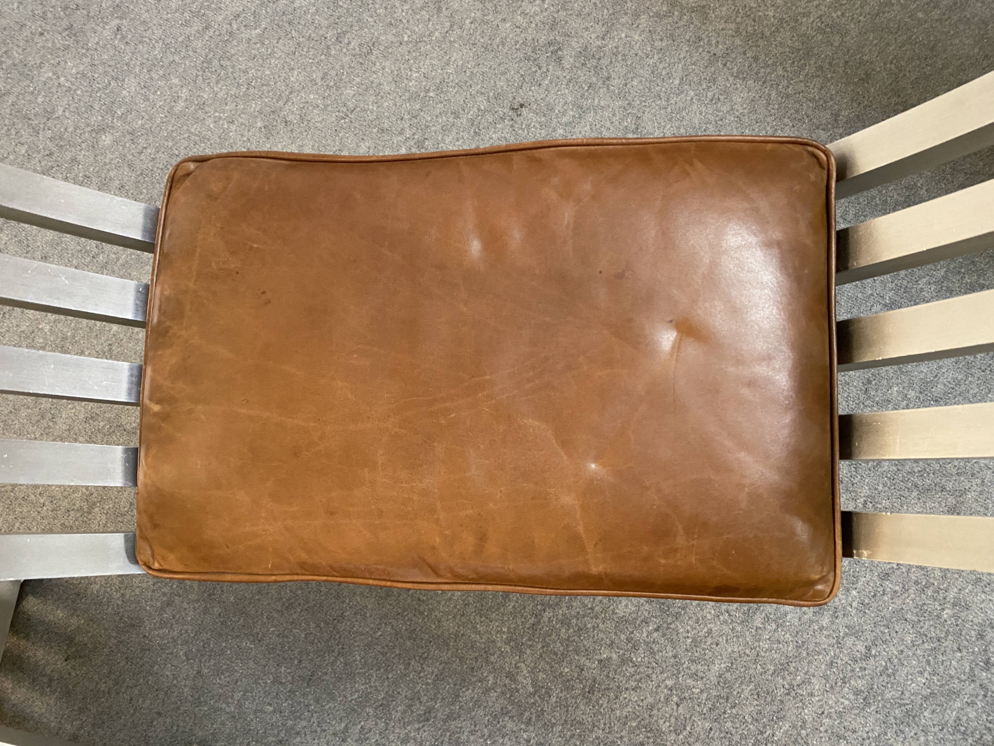 Pair of curule chairs designed by John Vesey, 1958, USA, brushed aluminum, walnut and leather