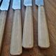 9 knives with bakelite handles, stainless steel, 1950