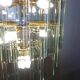 Brass chandelier and beveled glass, Italian manufacturing