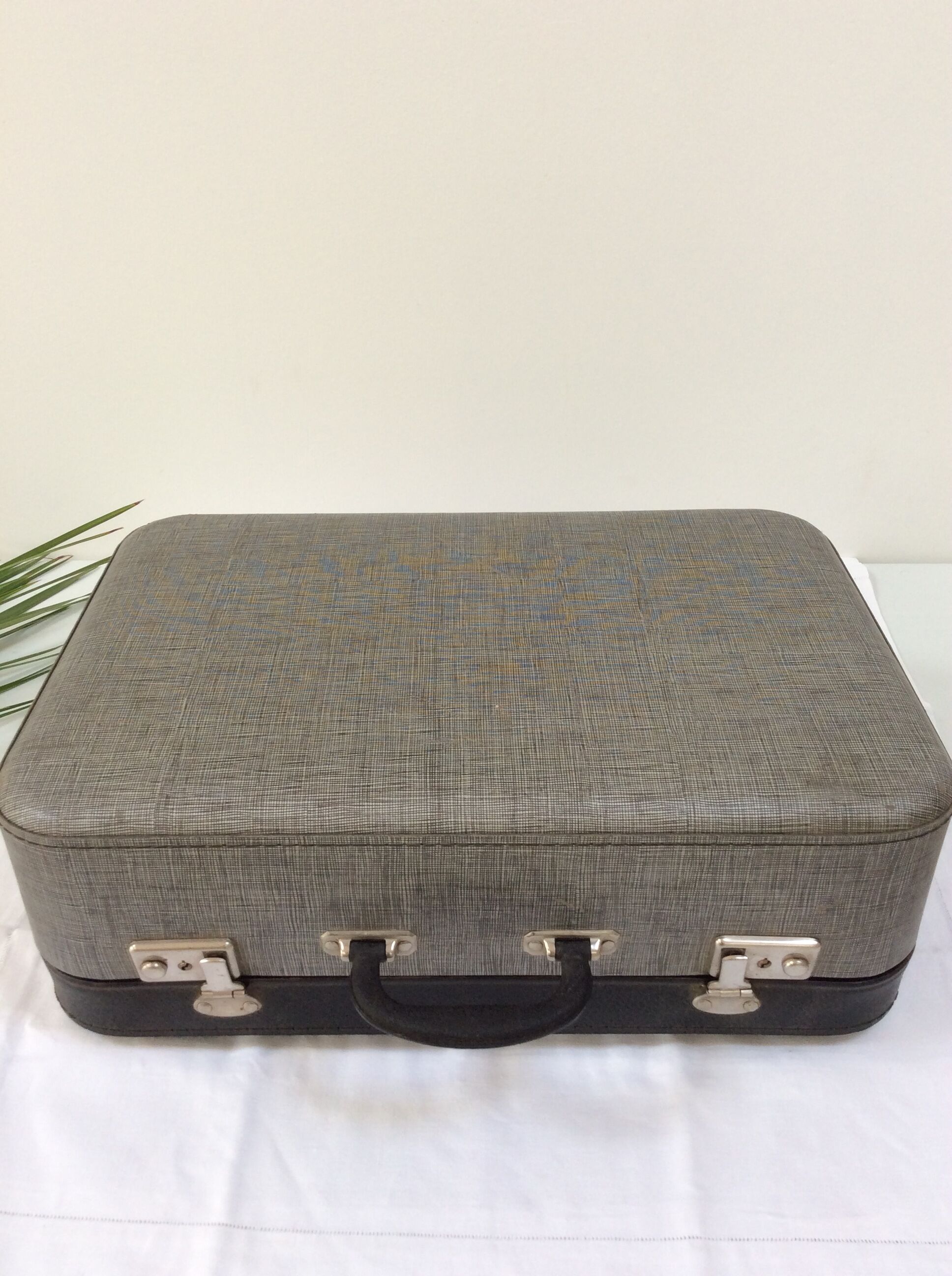 Old gray cardboard suitcase