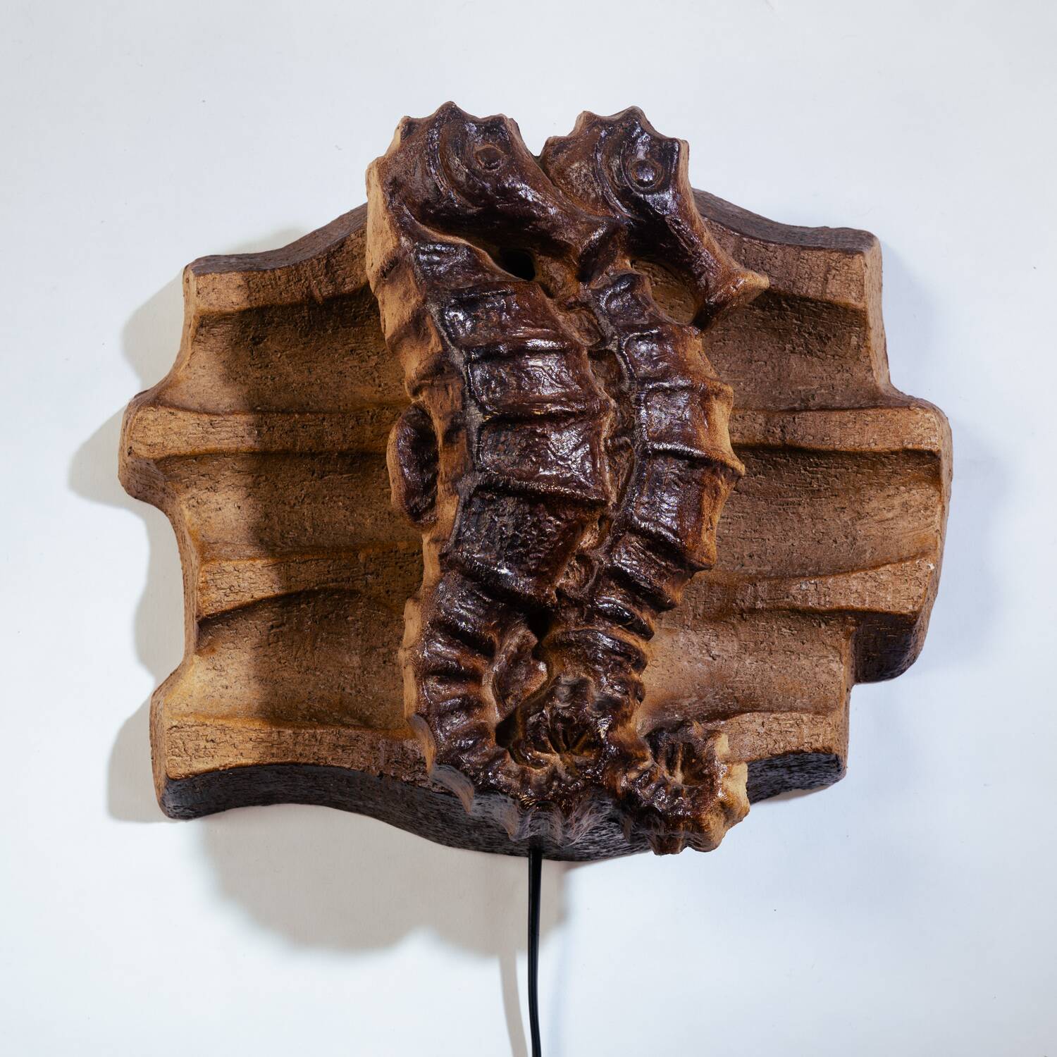 Brutalist ceramic Seahorse wall ight, 1970s