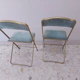 Two folding opera chairs in velvet