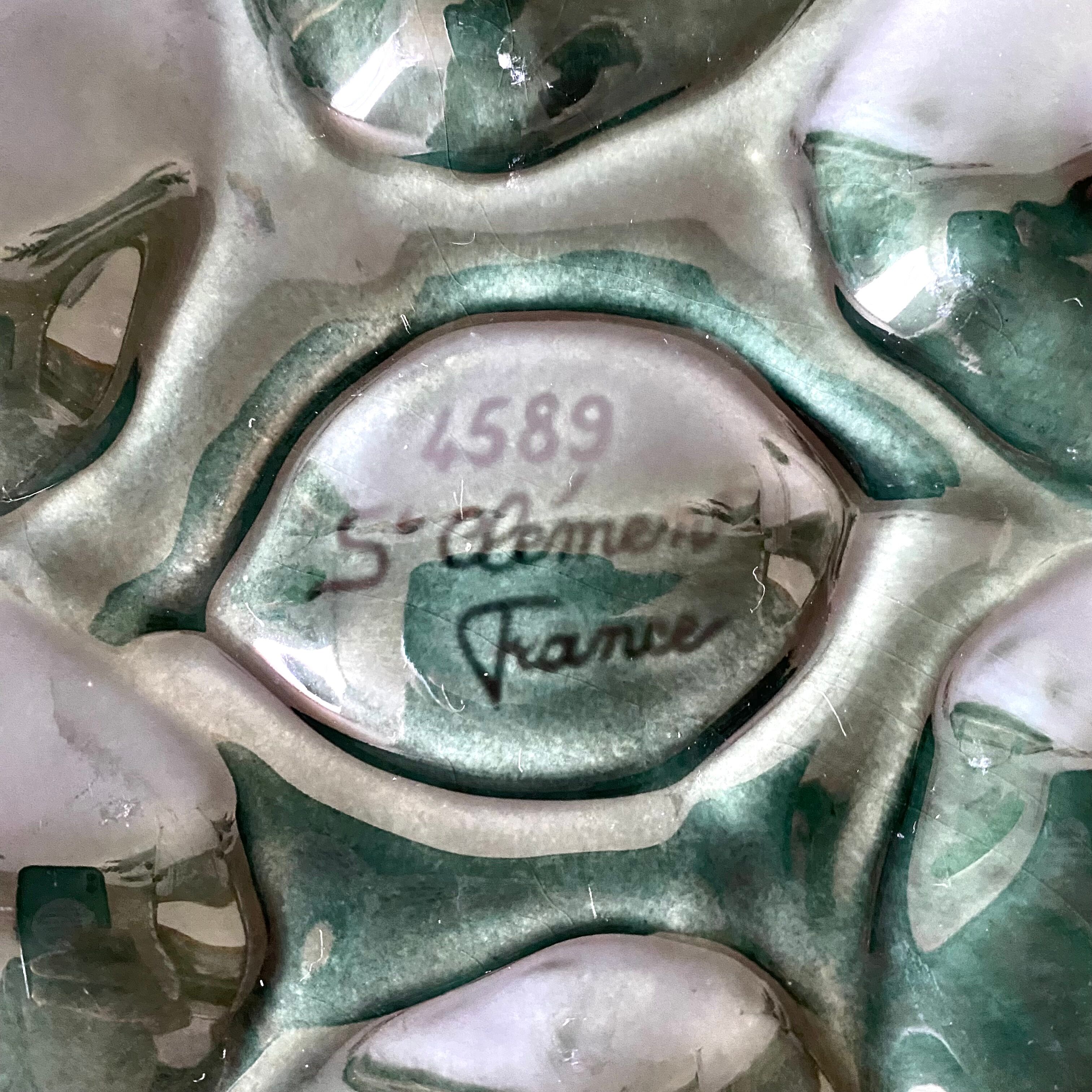 Oyster plates in St Clément slip