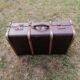 Antique suitcase in leather wood and vintage metal