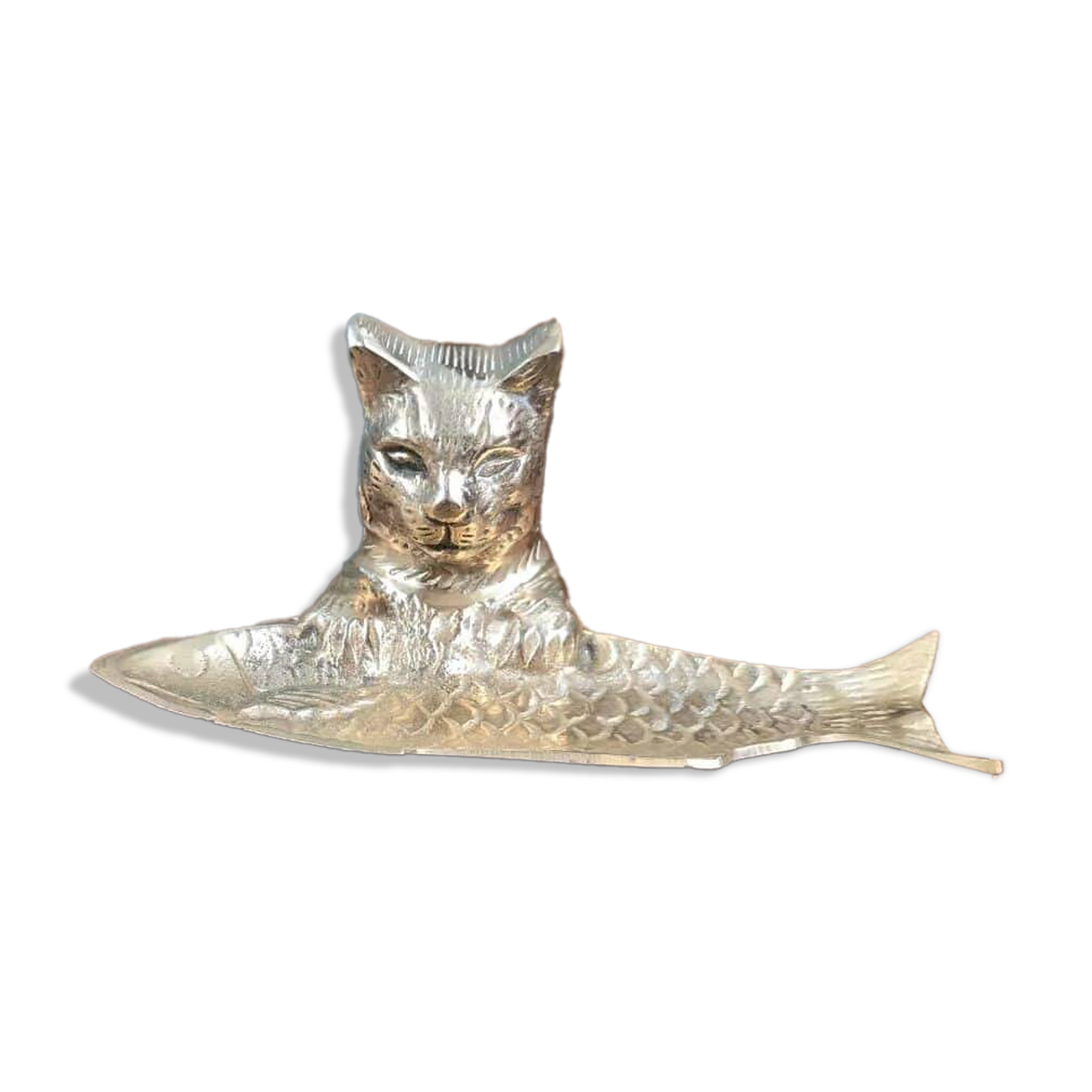 Vintage cat fish catchall in brass on a solid wood base.