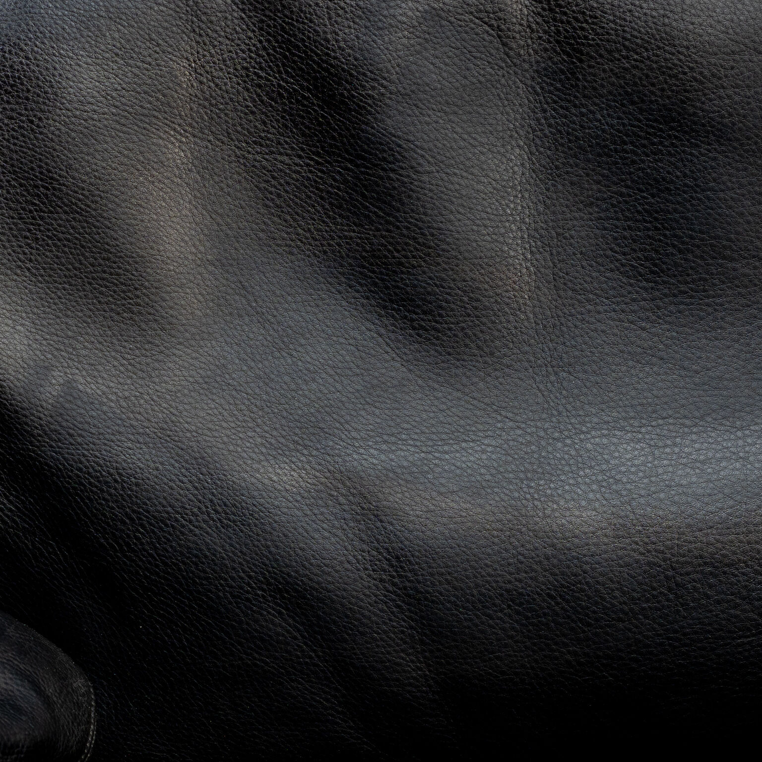 Vintage armchair, leather and travertine