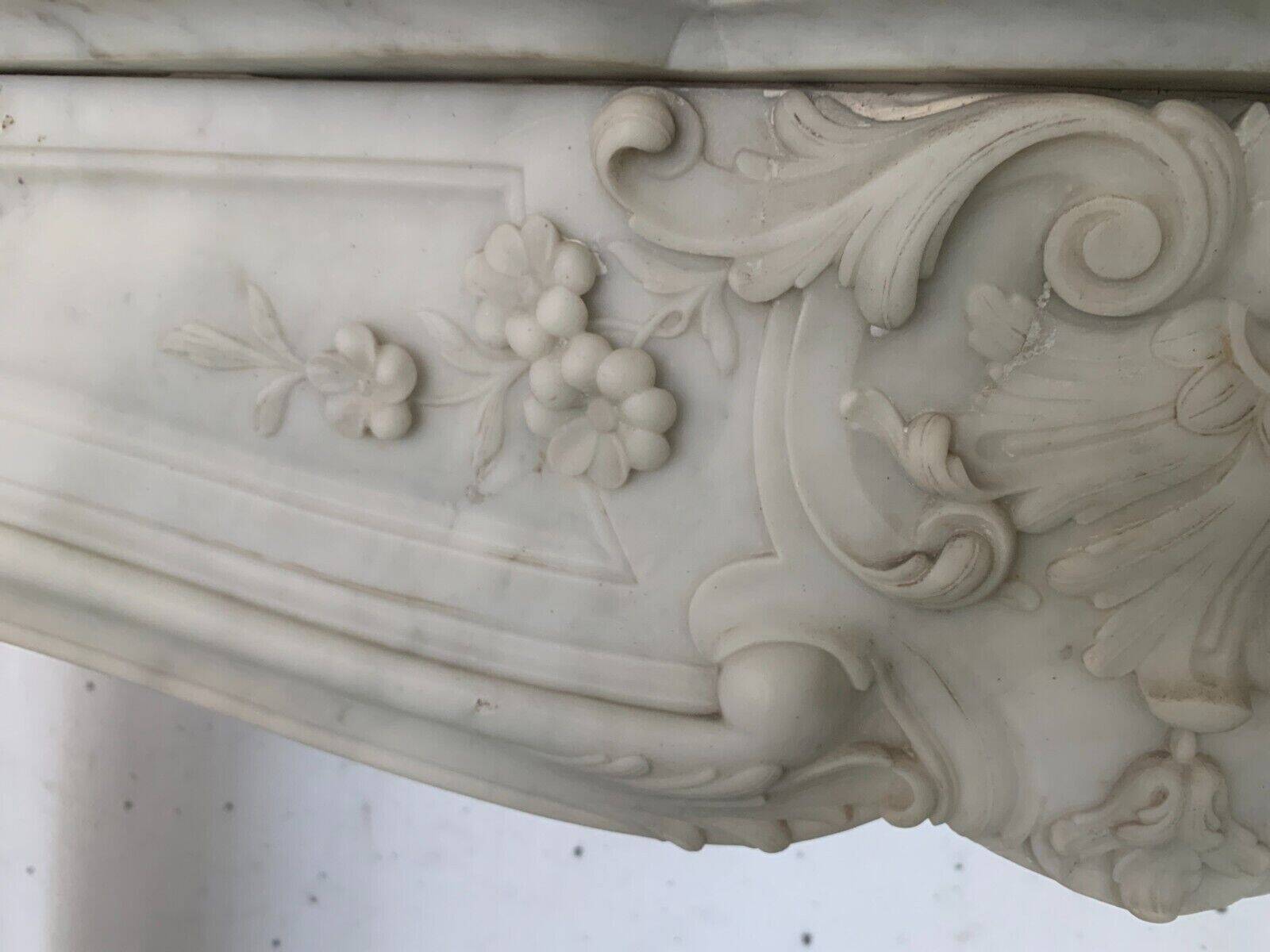 Louis XV style fireplace in white Carrara marble 19th century