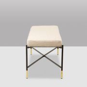 Pair of white benches, in lacquered and gilded metal. 2000s.