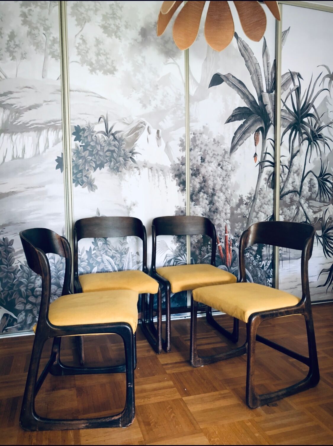 Suite of four Baumann sled chairs