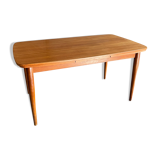 Extendable teak dining table