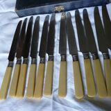 box of 12 stainless steel knives with bakelite handle and silver metal ferrule art decp