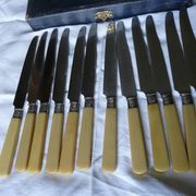 box of 12 stainless steel knives with bakelite handle and silver metal ferrule art decp