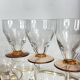 9 Art Deco wine or water glasses with amber stems, 9 cl.