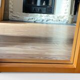 Modernist mirror in solid elm from the 1950s.