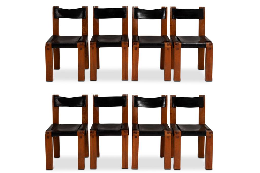 Pierre Chapo. Series of 8 "S11" chairs in elm and leather. 1960s-70s.