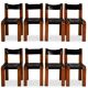 Pierre Chapo. Series of 8 "S11" chairs in elm and leather. 1960s-70s.