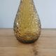 Amber-colored empoli glass decanter