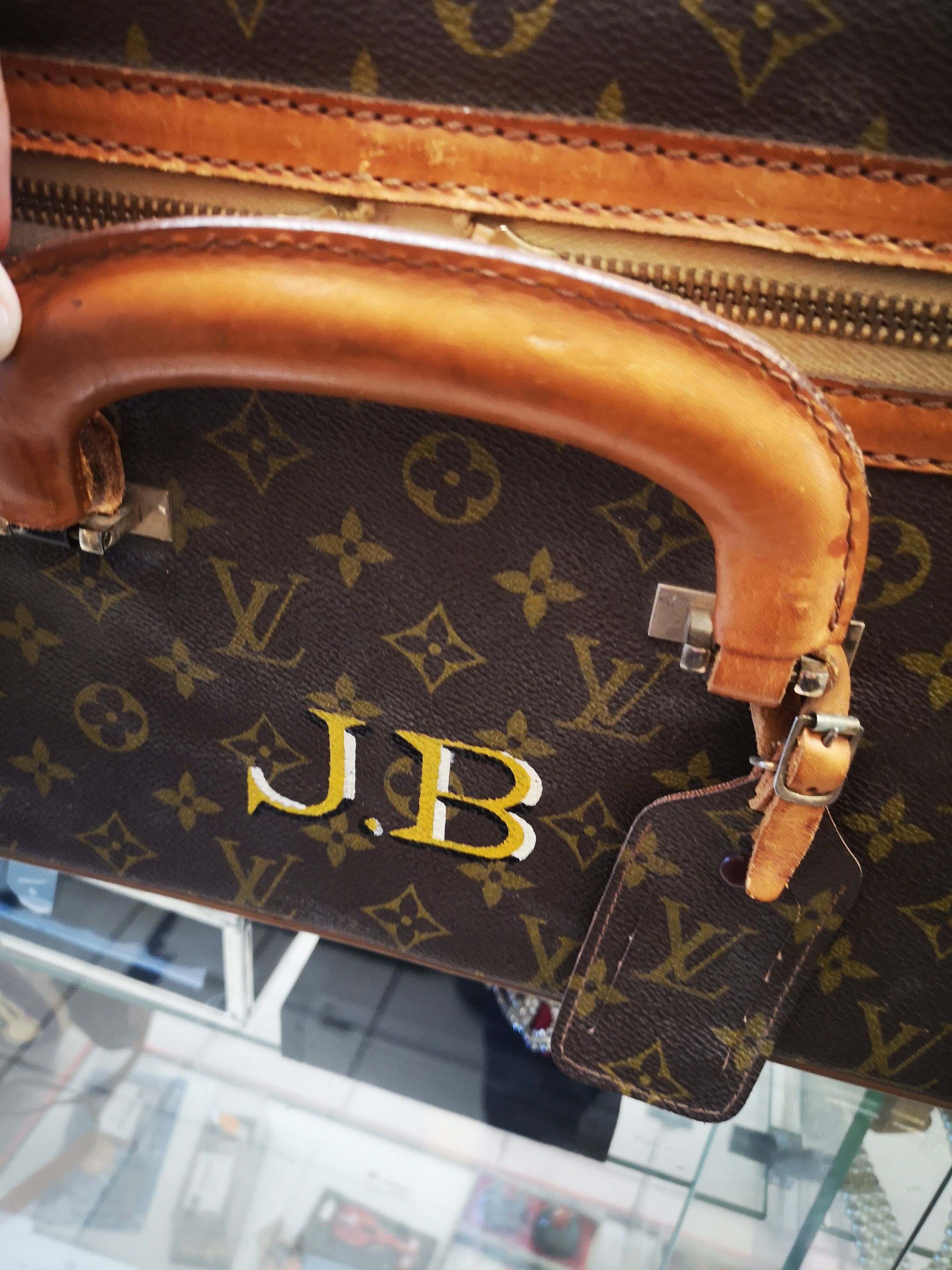 Louis Vuitton leather suitcase