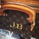 Louis Vuitton leather suitcase