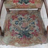 Paire de fauteuils Régence en noyer sculpté