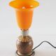 Orange glass ball lamp with wood
