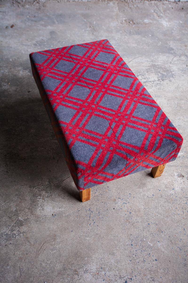 Large red and grey wool tartan upholstered bench with wooden frame