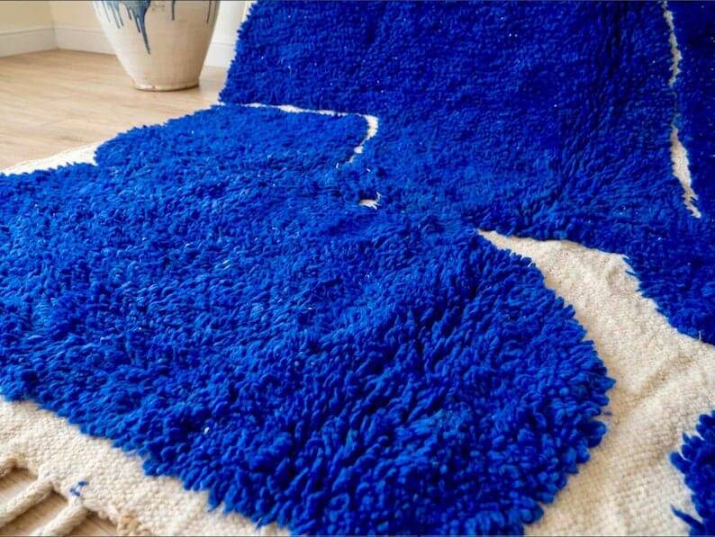 Handmade pure wool rug with blue patterns, 150/250 cm.