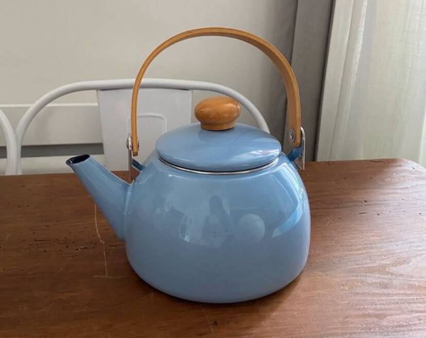 Vintage blue enamelled tin teapot with wooden handle