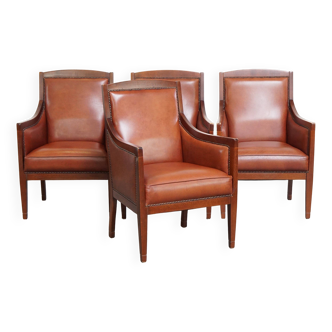 Ensemble majestueux et luxueux de 4 fauteuils design Art Déco en cuir de vachette couleur cognac