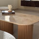Table basse ovale en travertin et bois cannelé brut