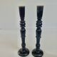 Pair of antique ebonised wooden candlesticks from the 19th century.