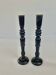 Pair of antique ebonised wooden candlesticks from the 19th century.