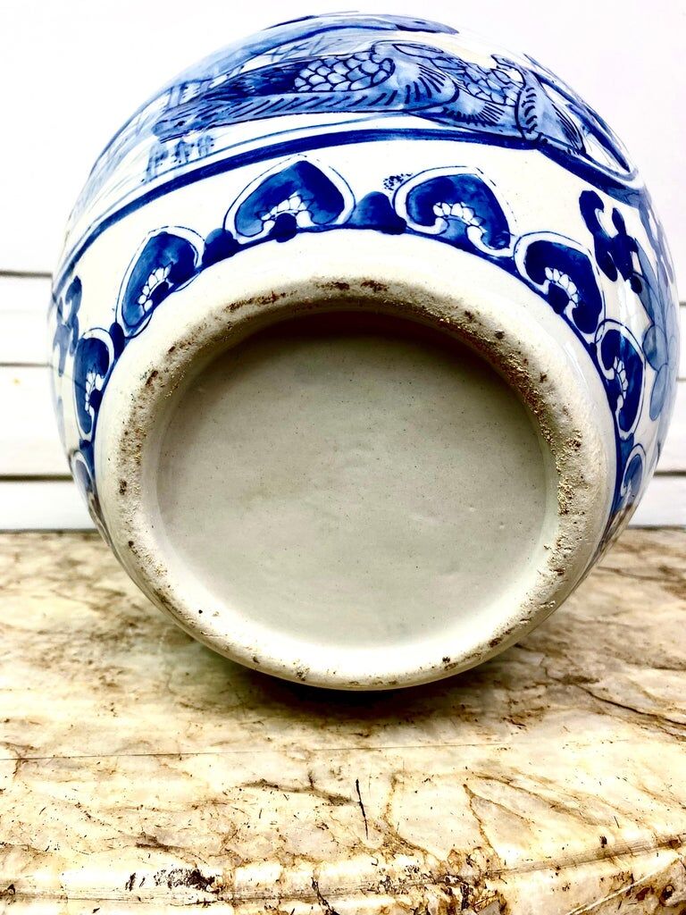 Chinese vase in blue-white porcelain decorated with lotus flowers