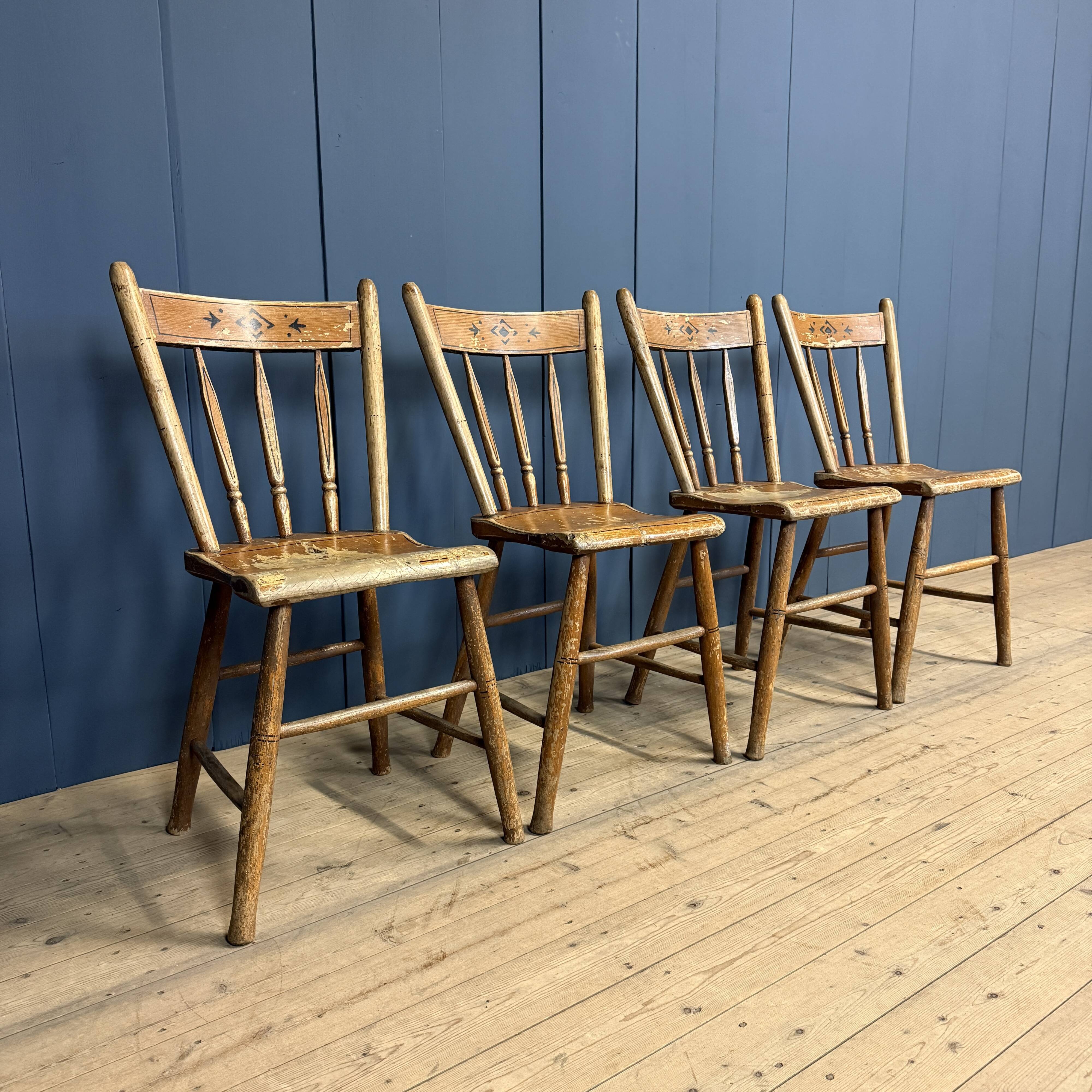 Set of four painted Dutch kitchen chairs.