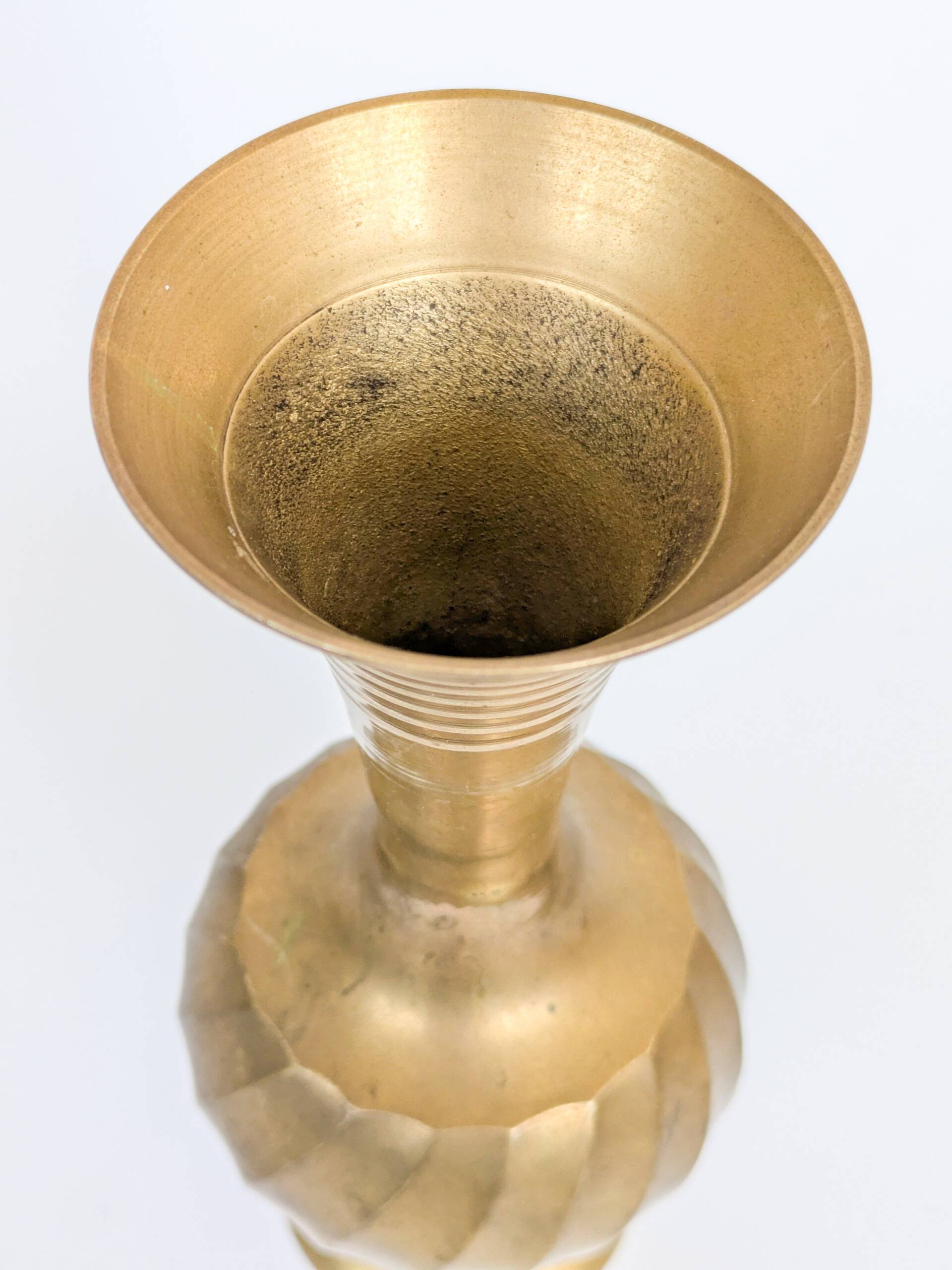 Solid brass Midcentury vase in trumpet shape with twisted details.